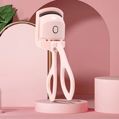 Image of Automatic Eyelash Curler.